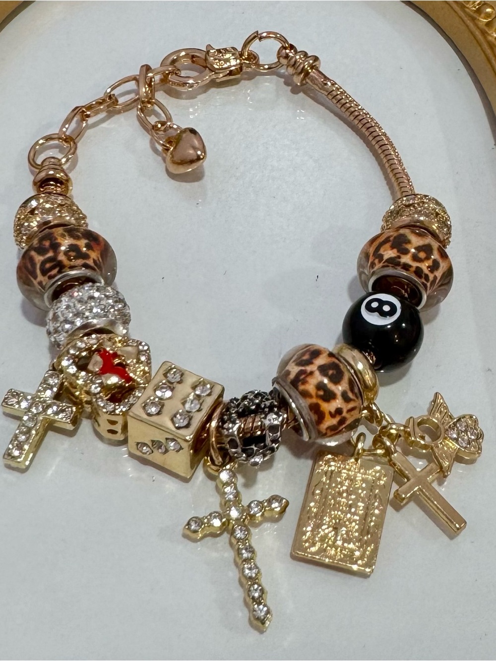 New Gold Tone Charm Bracelet with Leopard Beads and Black Accent